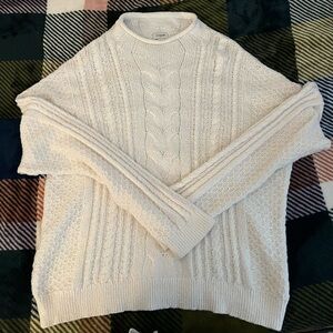white cable knit sweater